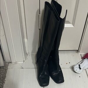 This is a Franco Sarto tall boot in black leather